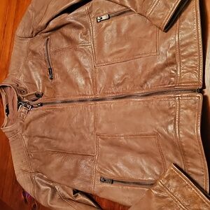 Womens light brown leather jacket.‎